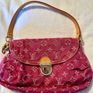 Pink monogram denim bag from Louis Vuitton .